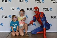 Pow! Boom! TQL superhero-themed summer picnic draws record crowd