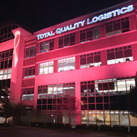 TQL headquarters illuminated in pink for Breast Cancer Awareness Month.